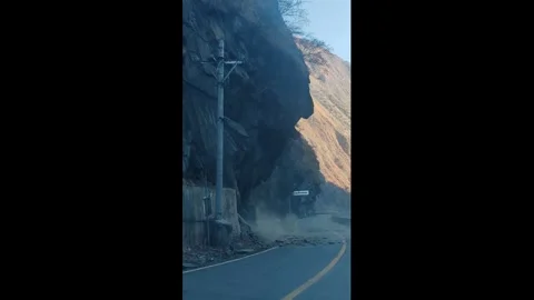 China: Massive landslide captured on mountain road in Sichuan, China Stock-Footage 325772122