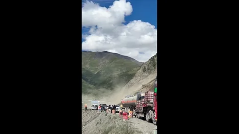 China: Massive rockfall and mudslide blocks National Highway 317 in Tibet... Stock Footage 343792128