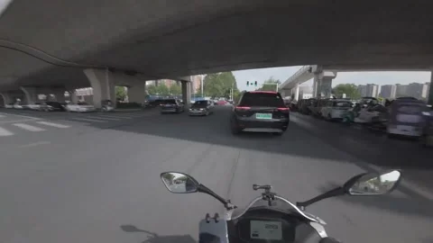 China: Motorcycle collision at intersection in Xinyang, Henan, China Stock Footage 332749345