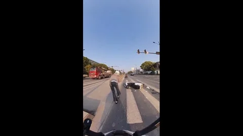 China: Motorcycle collision at intersection in Zhejiang, China Stock Footage 332415920