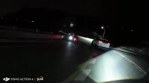 China: Motorcycle crashes after overtaking on highway curve in Sichuan, C... Stock Footage 334049508