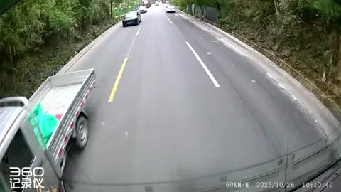 China: Motorcycle thrown off cliff during risky overtake in Guizhou, Chin... Stock Footage 320637385