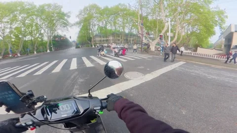 China: Motorcycles collide at intersection in Jiangsu, China Stock Footage 332685125