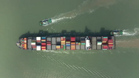 China overseas trade and globalization, aerial view tugboats and container ship Stock-Footage 213595751