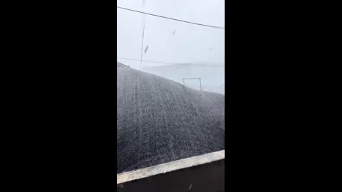 China: Powerful windstorm tears debris from rooftop in Anhui, China Stock Footage 340427974