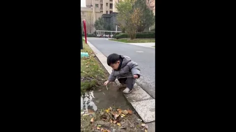 China: Puddle Gone Wrong Stock Footage 322088204