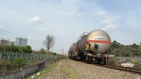 China Railway Tank Train with Worker in Chengdu Stock Footage 334701935