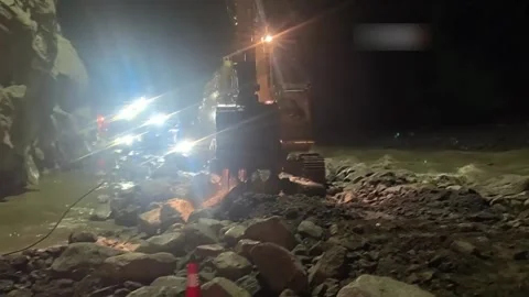 China: Rescue teams press on with grid searches for survivors in mudslide... Stock Footage 344120221