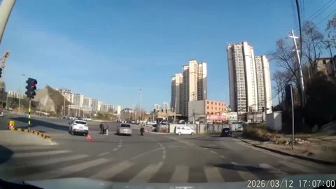 China: Scooter collision at intersection in Guizhou, China Stock Footage 332767222