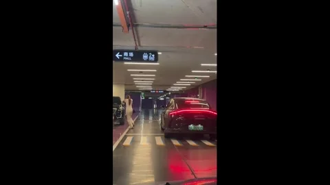 China: Self-parking car amuses driver in underground parking in Jiangxi, ... Stock Footage 336931960