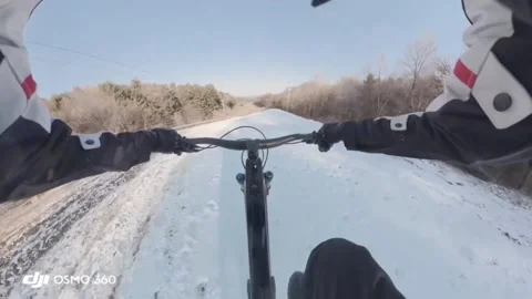 China: Snow Cycling Gone Wrong Stock Footage 322089153