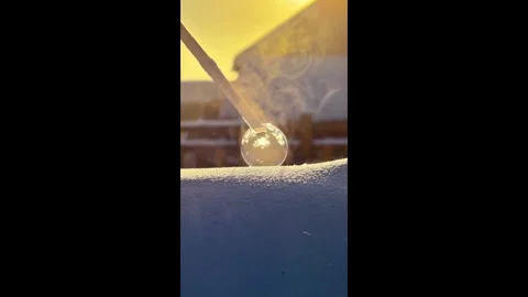 China: Soap bubbles turn to ice instantly in freezing temperatures in Chi... Stock Footage 327694828