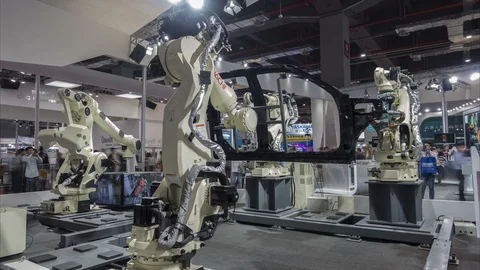 China technology trade show - time lapse production robots Stock Footage 85863543