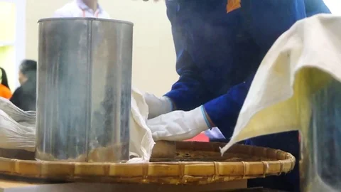 China traditional stone pressing process of tea field Stock Footage 70693421