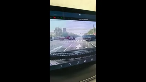 China: Two flatbed trucks collide at intersection in Hebei, China Stock Footage 332685640