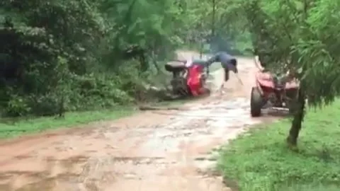 China: Two Off-Road Riders Crash into Trees Within Seconds on Mountain Tr... Stock Footage 320573355