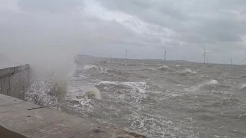 China: Typhoon Fengshen affects ferry services, cools temperatures in sou... Stock Footage 320669146