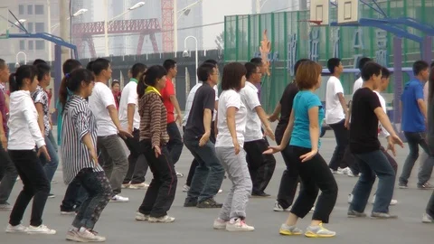 China, workmen exsercizing  in the factory yard Stock Footage 116806388