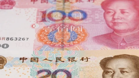 China yuan notes close up tracking. Yuan money. Dolly shot, low angle. 4K Video stock 125531708