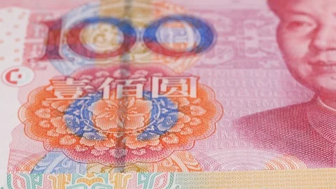 China yuan notes macro tracking. Dolly shot, low angle. 4K Stock Footage 125532740
