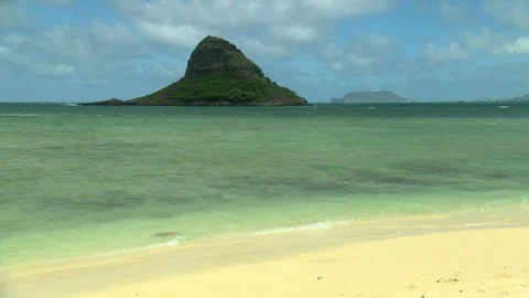 Chinamanʻs Hat Beach Sand and Ocean Zoom in Stock Footage 81528047