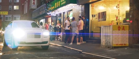 Chinatown anamorphic flare Roll Royce Stock Footage 116764034