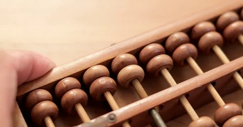 Chinese abacus is a calculating tool Stock Footage 79526374