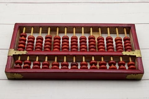 Chinese Abacus. Math calculation tool. Ancient calculator. Stock Photos