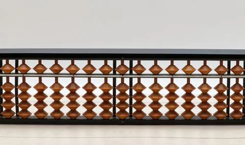 Chinese Abacus. Math calculation tool. Wooden background Stock Photos