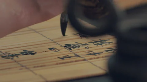 Chinese Art Of Calligraphy, Write with a brush on bamboo slips，china Stock Footage 140139813