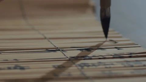 Chinese Art Of Calligraphy, Write with a brush on bamboo slips，china Stock Footage 140140727
