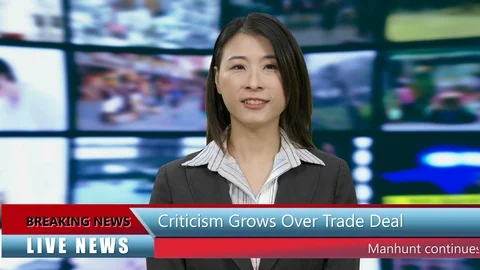 Chinese Asian American news anchorwoman in studio with lower thirds Stock Footage