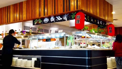 Chinese buffet modem cafeteria style self serving station chef in the Stock Footage 168240995