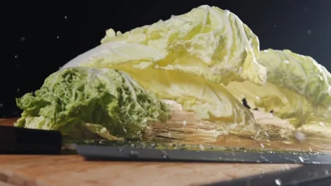 Chinese cabbage falling in slow motion. Stock Footage 140498288