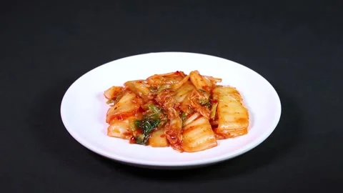 Chinese cabbage kimchi on a plate rotating Stock Footage 326175697