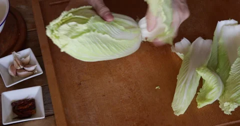 Chinese cabbage leaves teared off from cabbage head Stock Footage 329968150