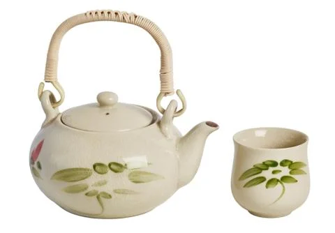 Chinese ceramic teapot with a cup with a pattern Stock Photos