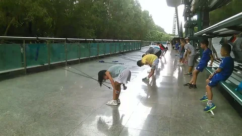 Chinese children are practicing basic swimming skills Stock Footage 93555518