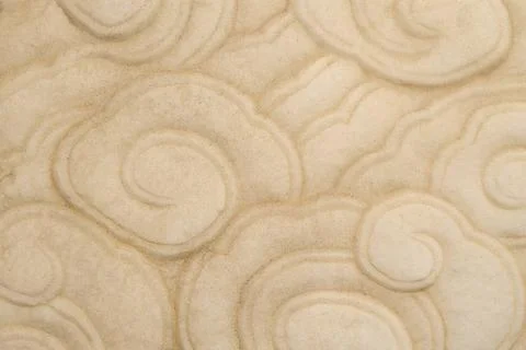 Chinese Cloud Pattern Carving Cloud pattern carved into marble at a histor... Stock Photos