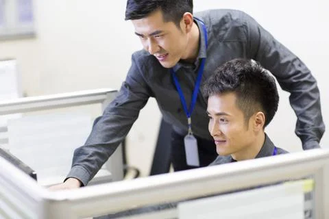  Chinese Computer programmers at work Beijing China Copyright: xLanexOatey... Stock-Fotos
