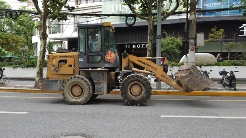 Chinese construction engine driving fast on the street, 4K Stock Footage 158793675