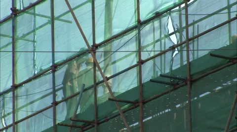 Chinese construction workers on scaffolding Stock Footage 56594920