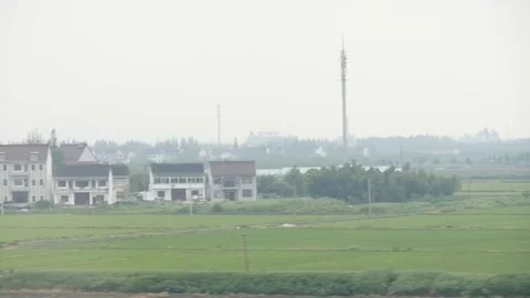 Chinese Countryside From Train Stock Footage 123981362