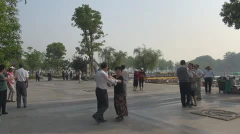 Chinese couples dancing in park, Ninjing, China Stock Footage