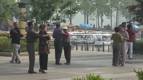 Chinese couples dancing in park, Ninjing, China Stock Footage
