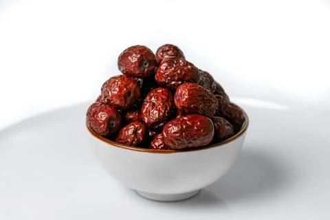 Chinese dates in a cup Stock Photos