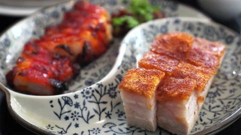 Chinese dim sum full table meal Crispy and bbq pork xiaolongbao and shumai Stock Footage 136994901