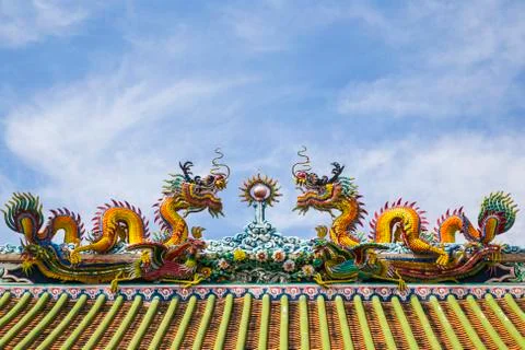 Chinese dragon on blue sky with cloud Stock Photos