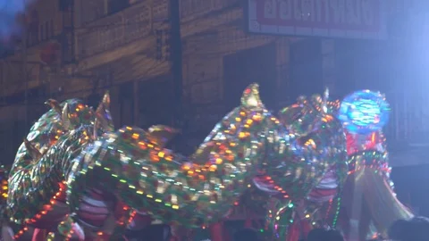 Chinese dragon performing at night during Chinese new year festival. Video stock 110815379