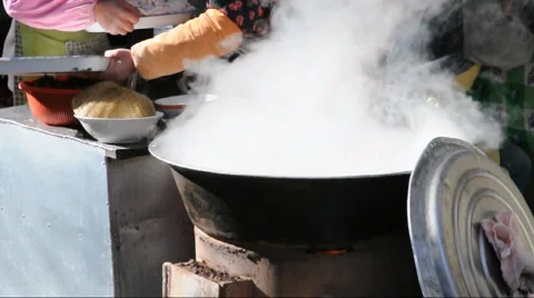 Chinese Dumplings during cooking Stock Footage 885965